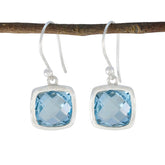 Chloe Blue Solitaire Dangle Earrings for Glam Looks Blue Topaz Blue Dangle