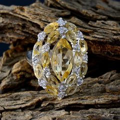 Victoria yellow gemstone statement ring - pear halo