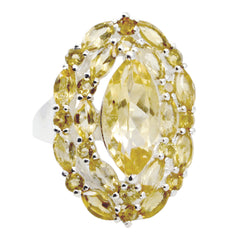 Victoria yellow gemstone statement ring - pear halo