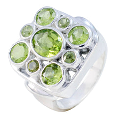 Nia sterling silver navratna green gemstone ring featuring multi peridot stones in a cluster setting
