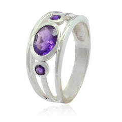 Tereza abstract purple gemstone ring with silver band and three purple stones in varying sizes