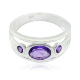 Tereza silver abstract purple gemstone ring with three purple stones in a modern design