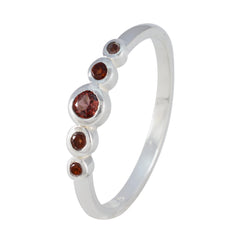 Yan abstract red gemstone ring with five red gemstones set in silver band
