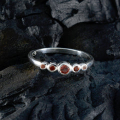 Yan silver ring featuring an abstract red gemstone ring design with multiple small red stones
