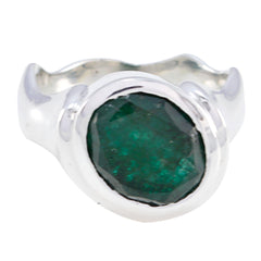 Savannah green solitaire ring with oval faceted green gemstone in polished silver bezel band
