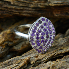 Priya abstract purple gemstone ring in sterling silver with clustered round purple stones on textured band