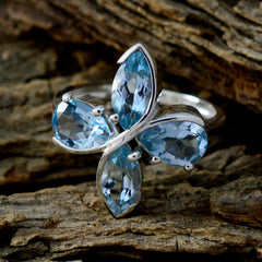 Sarah blue gemstone floral ring with four marquise cut blue stones in silver setting