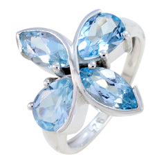 Sarah blue gemstone floral ring with four pear-shaped blue gemstones in silver setting