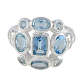 Dewi blue navratna gemstone ring featuring multiple sparkling blue stones set in silver