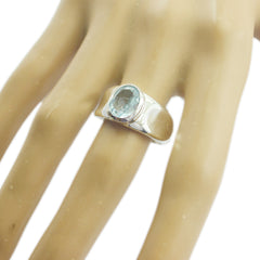 Zoey Blue Solitaire Engagement Ring - Dazzling Gemstone Design