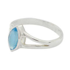 Nari blue solitaire geometric ring featuring a marquise-cut blue stone set in silver band