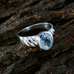 Maria Blue Solitaire Ring with Elegant Design