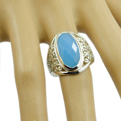 Dayana Blue Solitaire Ring with Intricate Silver Detail