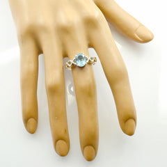Saanvi Blue Solitaire Twist Ring with Stunning Gemstone