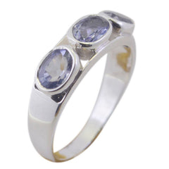 Lily silver ring with three blue gemstones designed as blue trilogy gemstone ring