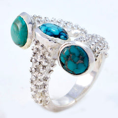 Natalie contemporary turquoise trio ring with three turquoise stones set in textured silver band