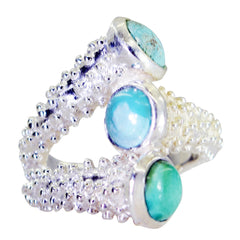 Natalie contemporary turquoise trio ring with three turquoise stones on textured silver band