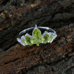 Wen green gemstone crown ring with marquise peridot center and side marquise stones on sterling band