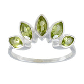 Jia green gemstone crown ring with five marquise-cut green stones set in silver band