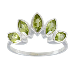 Jia green gemstone crown ring with five marquise-cut green stones set in silver band