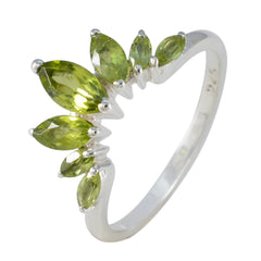 Kristine silver green gemstone crown ring with marquise-cut stones arranged in a crown design
