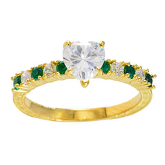 Angel gold ring with heart-shaped center stone and green gemstone statement ring side accents