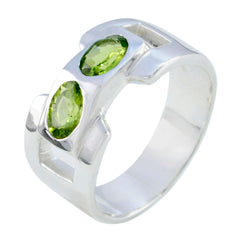 Siti silver ring featuring two green gemstones in a green toi et moi ring design
