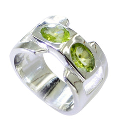 Siti silver ring featuring two oval green gemstones in green toi et moi ring design