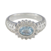 Putri artisan blue halo ring with oval aquamarine center and pave diamond halo on sterling silver band