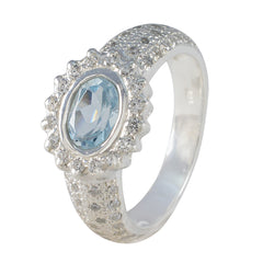 Putri artisan blue halo ring with oval aquamarine center and pave crystal halo on polished silver band