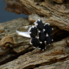 Lara sterling silver band black gemstone floral ring with seven oval black stones in a flower cluster