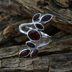 Teresa leafy red gemstone ring with marquise and oval shaped red stones set in silver band