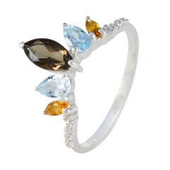 multicolor crown gemstone ring by Soojin featuring marquise smoky quartz aquamarine and citrine on silver band