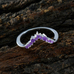 Jia sterling silver V shaped band with small amethyst stones purple gemstone crown ring on rustic bark