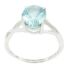 Xiu Luxurious Blue Solitaire Ring in Silver Elegance Blue Topaz Blue
