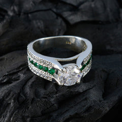 Elena Luxurious White Halo Ring with Emerald Accents