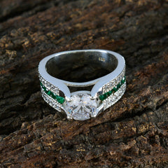 Elena Luxurious White Halo Ring with Emerald Accents