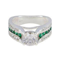 Elena Luxurious White Halo Ring with Emerald Accents Cubic zirconia CZ White