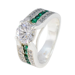Elena Luxurious White Halo Ring with Emerald Accents