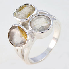 Florencia modern golden trilogy ring with three large transparent stones set in silver band