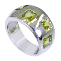 Priya modern green gemstone ring with square green stones set in wide silver band