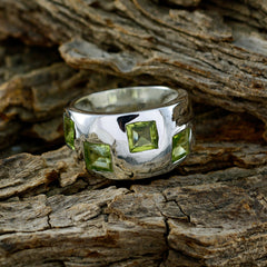 Modern green gemstone ring by Priya with square green stones set in polished silver band