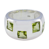 Priya modern green gemstone ring with square green gemstones set in wide silver band