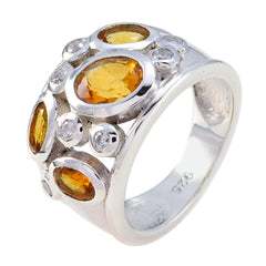 Evelyn modern yellow gemstone ring with multiple oval yellow stones set in silver band