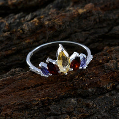 Leah multicolor crown gemstone ring with yellow, red, and purple gemstones on silver band