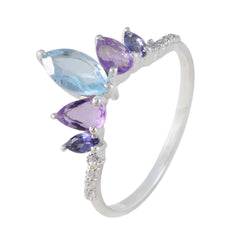 Sakura multicolor gemstone crown ring with blue and purple stones set on a silver band