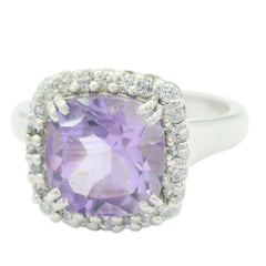 Priya purple halo gemstone ring with cushion-cut purple stone surrounded by small clear stones