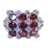 Camilla red navratna ring for women with clustered deep red stones and clear accent stones on silver band