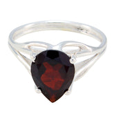 Soo-jin red solitaire gemstone ring with pear-shaped red stone set in silver band