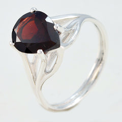 Soo-jin red solitaire gemstone ring with a heart-shaped red stone set in a silver band